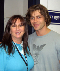 Karen and Ice Dancer, Peter Tchernychev. She's in shock because Peter has his arm around her!